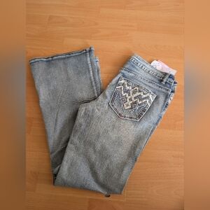 Blue Boot Cut Jeans with Distinctive Stitching